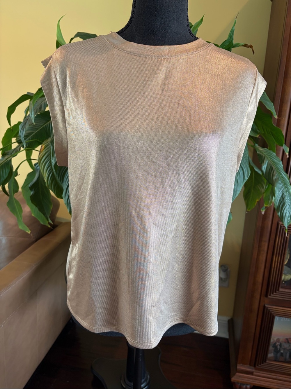 Anthropologie’s Porridge Shine Muscle Tee in gold - size Small